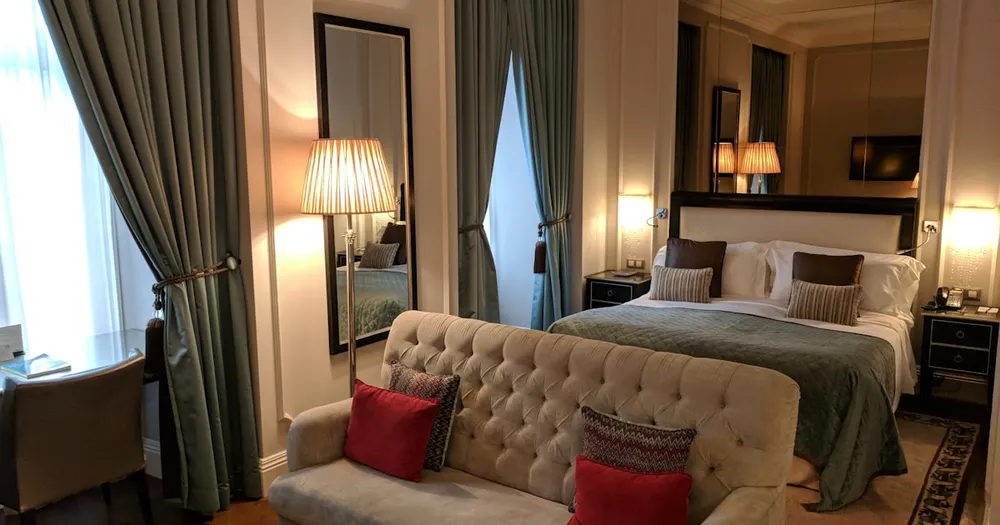 Elegant hotel room interior with modern amenities and warm lighting