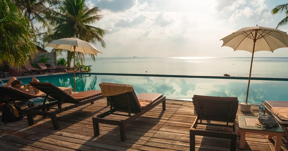 Modern hotel reception desk with warm ambient lighting and welcoming decor